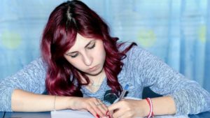 girl writing something