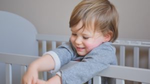 boy on his crib